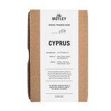 The Motley Cyprus Fragrance packaged in a cardboard box with a white label against a white background.