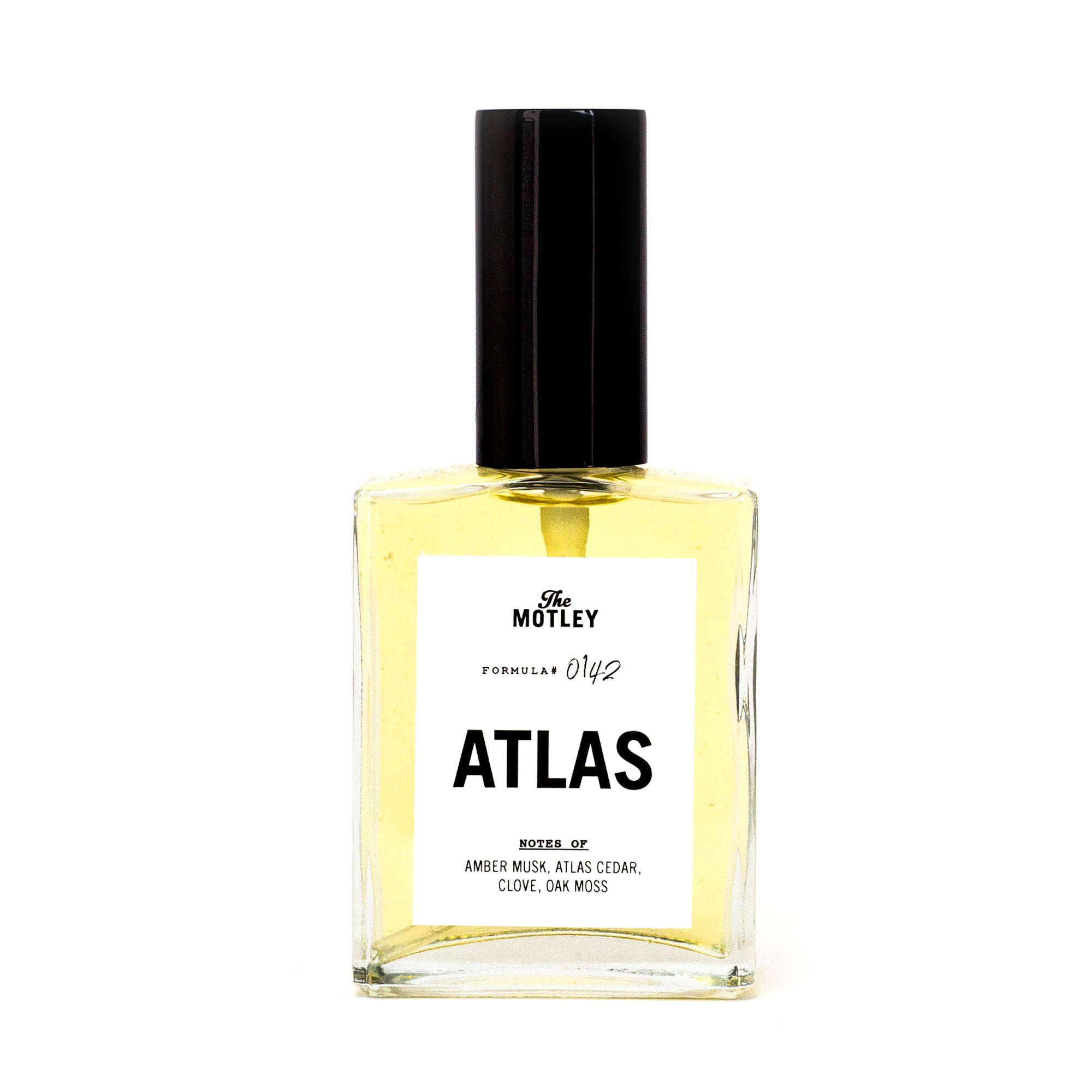 The Motley Atlas Fragrance in a glass bottle with gold liquid and a black pump cap against a white background.