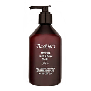 The Buckler's Reviving Hand & Body Wash in a red wine-colored bottle with a black pump top stands against a white background.