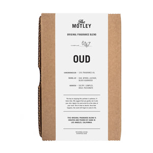 The Motley Oud Fragrance packaged in a cardboard box with a white label against a white background.